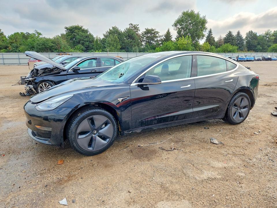 TESLA MODEL 3 2020 with VIN 5YJ3E1EA2LF643817 - Photo from auction