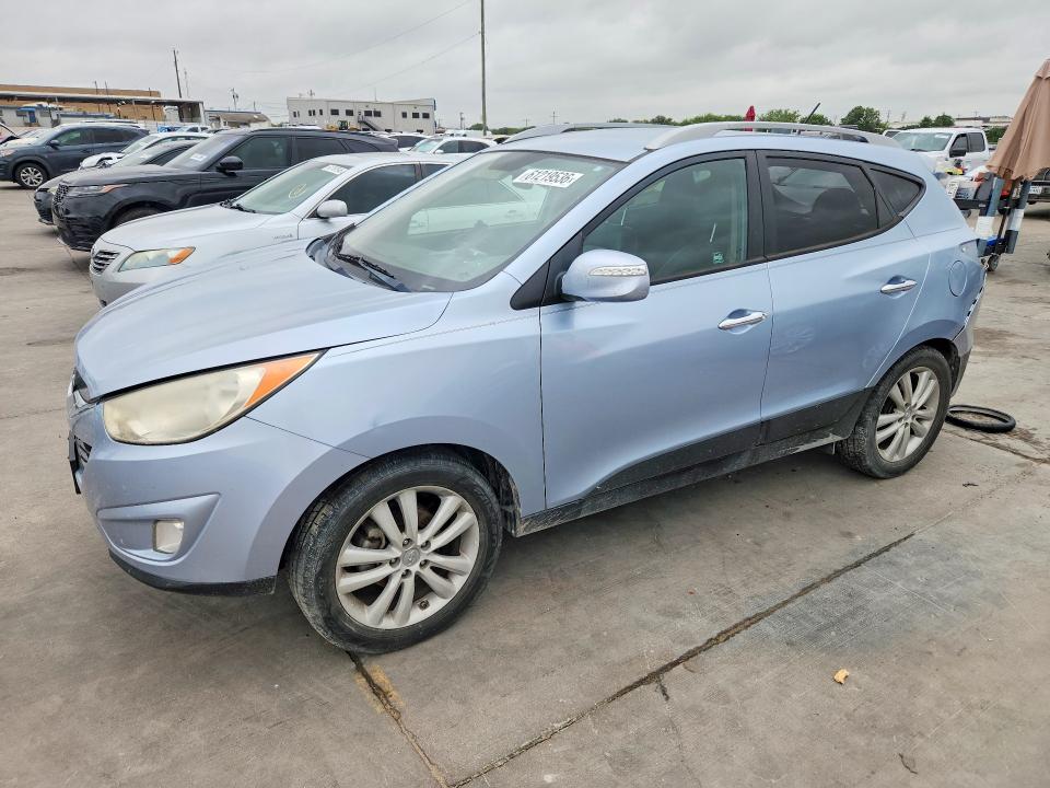 HYUNDAI TUCSON 2011 with VIN KM8JU3ACXBU210261 - Photo from auction