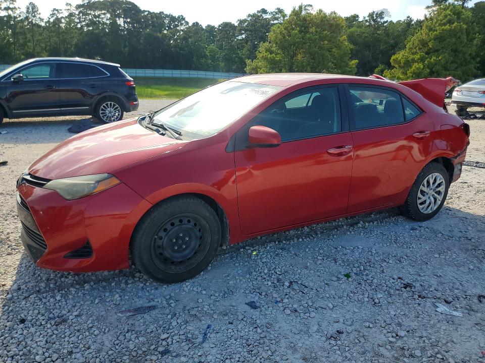 TOYOTA COROLLA 2018 with VIN 5YFBURHE6JP771037 - Photo from auction