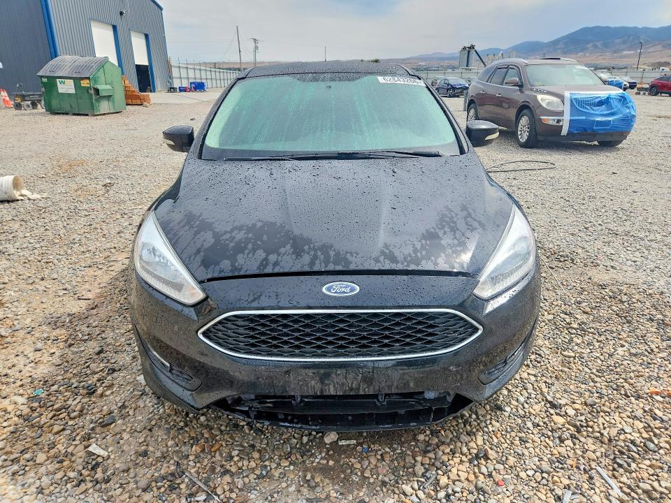 Photo 5 from auction – 2016 FORD FOCUS with VIN 1FADP3K29GL315388
