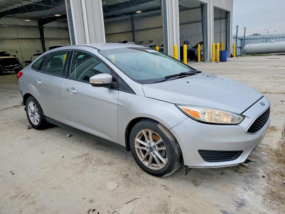 Photo 4 from auction – 2016 FORD FOCUS with VIN 1FADP3F22GL373689