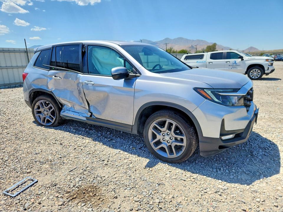 Photo 4 from auction – 2023 HONDA PASSPORT with VIN 5FNYF8H52PB032671