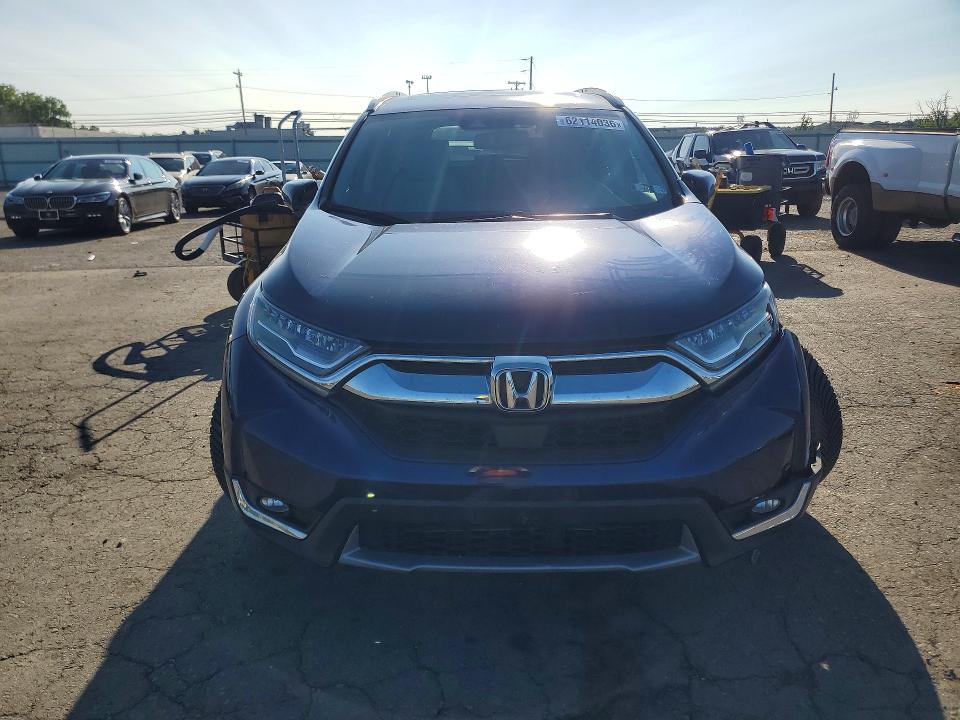 Photo 5 from auction – 2017 HONDA CR-V with VIN 5J6RW2H98HL070614
