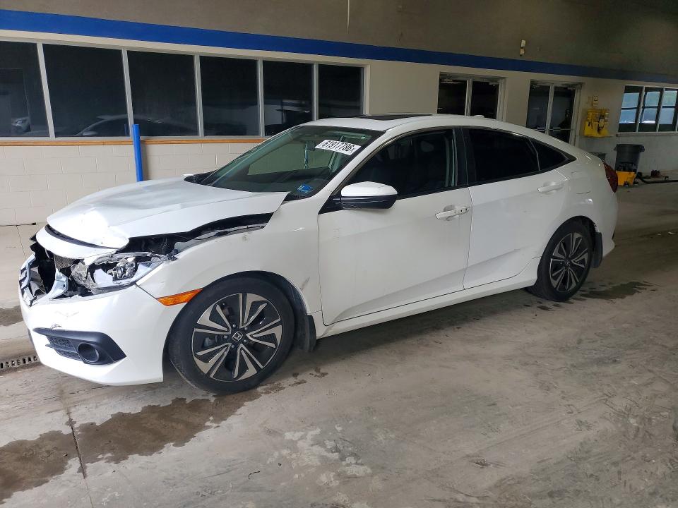 HONDA CIVIC 2018 with VIN JHMFC1F35JX006604 - Photo from auction