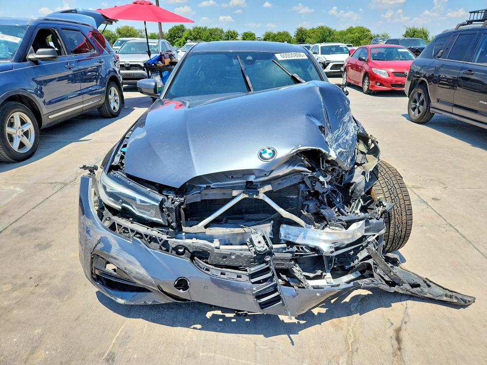 Photo 5 from auction – 2021 BMW 330I with VIN 3MW5R1J02M8B72359