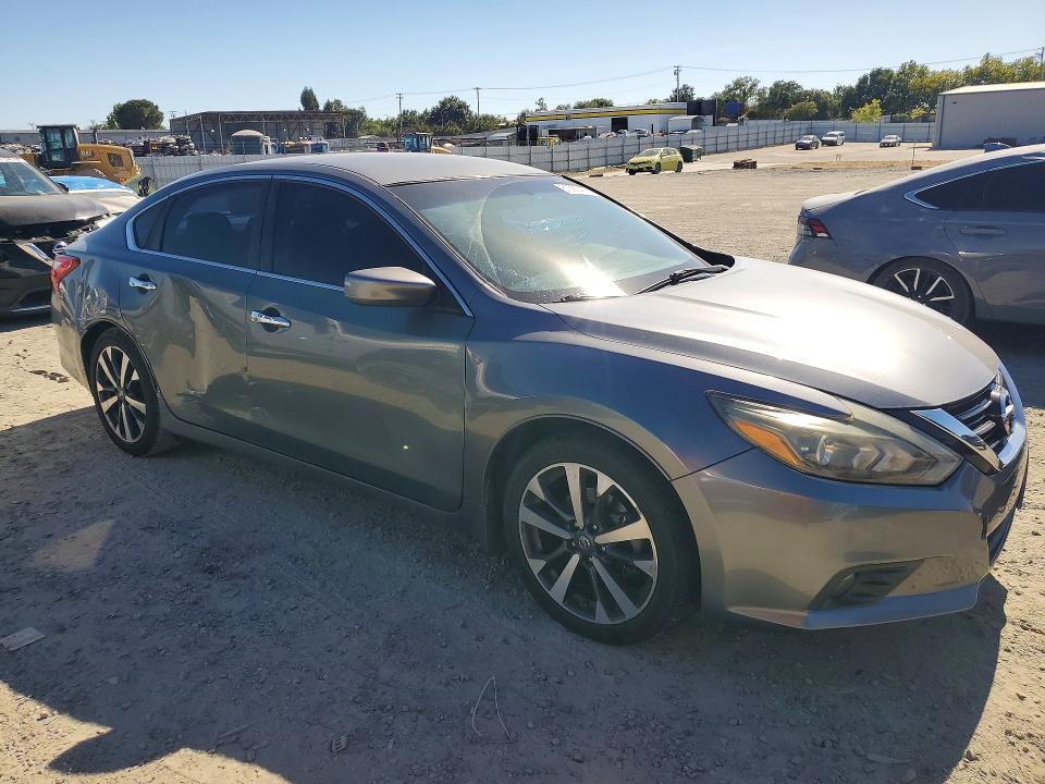 Photo 4 from auction – 2016 NISSAN ALTIMA with VIN 1N4AL3AP1GC135673
