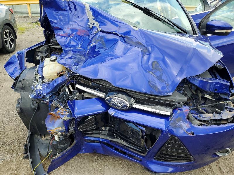 Photo 11 from auction – 2013 FORD FOCUS with VIN 1FADP3J26DL157301