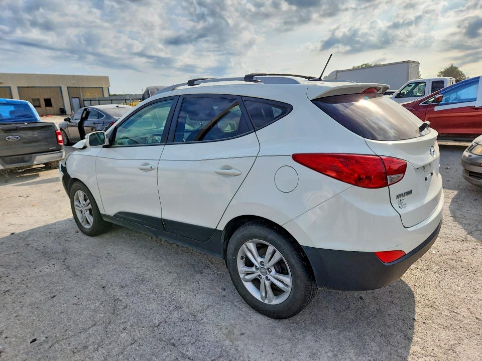 Photo 2 from auction – 2012 HYUNDAI TUCSON with VIN KM8JUCAC4CU396865