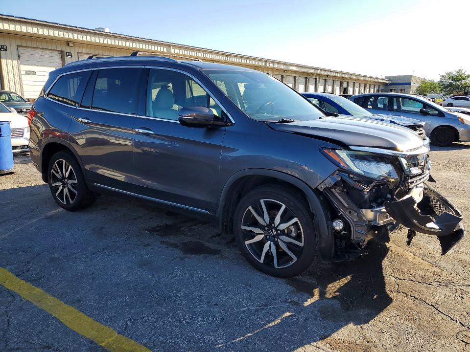 Photo 4 from auction – 2022 HONDA PILOT with VIN 5FNYF6H65NB051662