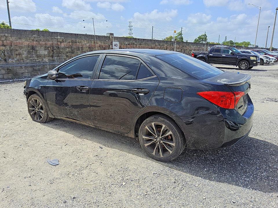 Photo 2 from auction – 2018 TOYOTA COROLLA with VIN 5YFBURHE3JP809565