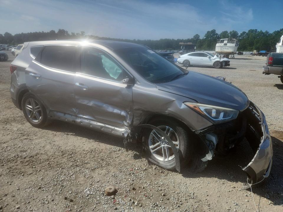 Photo 4 from auction – 2018 HYUNDAI SANTA FE SPORT with VIN 5NMZT3LB5JH077784