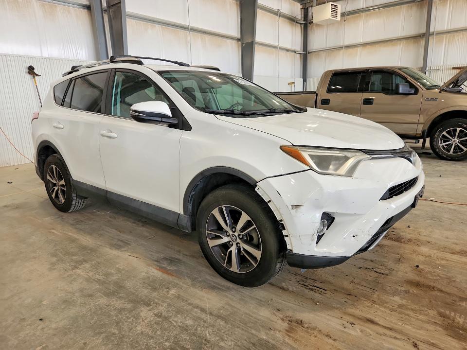 Photo 4 from auction – 2018 TOYOTA RAV4 with VIN 2T3RFREV6JW721242