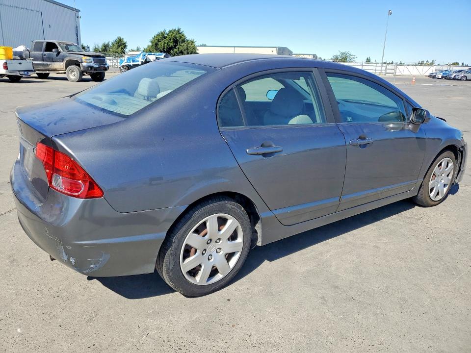 Photo 3 from auction – 2010 HONDA CIVIC with VIN 19XFA1F50AE001853