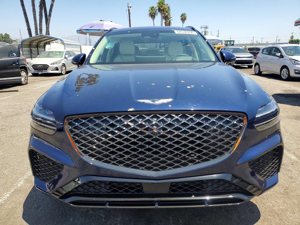 Photo 5 from auction – 2022 GENESIS GV70 with VIN KMUMCDTC8NU062412