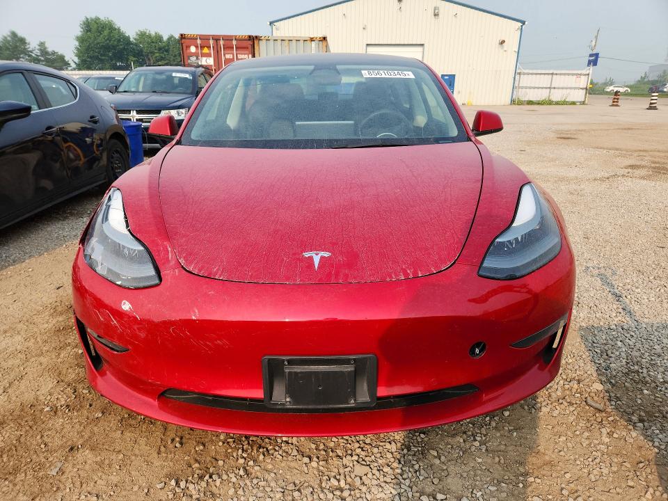 Photo 5 from auction – 2022 TESLA MODEL 3 with VIN 5YJ3E1EA6NF320714
