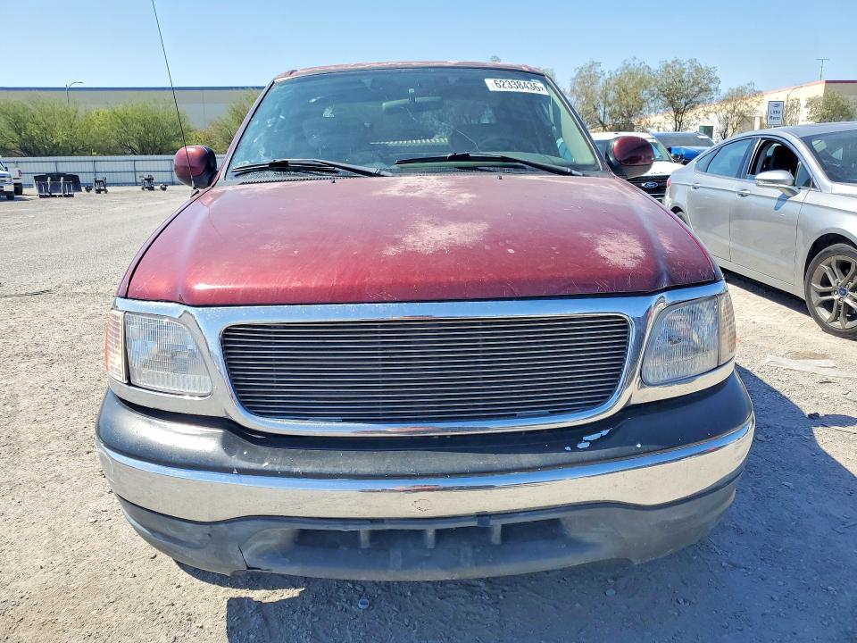 Foto 5 de la subasta – 2003 FORD F150 con VIN 1FTRW07683KB41584