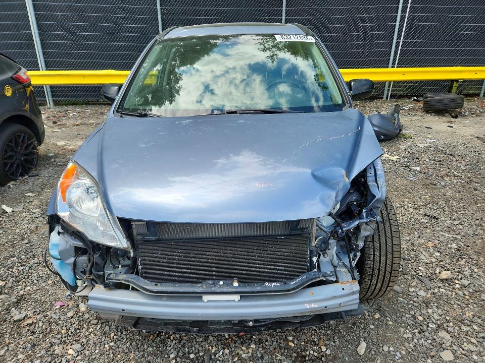 Photo 5 from auction – 2011 HONDA CR-V with VIN JHLRE4H57BC007273