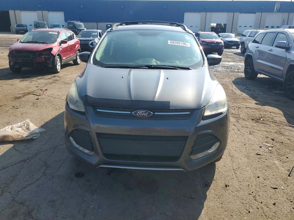 Photo 5 from auction – 2016 FORD ESCAPE with VIN 1FMCU9GX3GUA65531