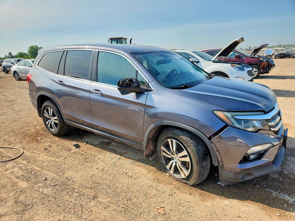 Photo 4 from auction – 2016 HONDA PILOT with VIN 5FNYF5H55GB023672