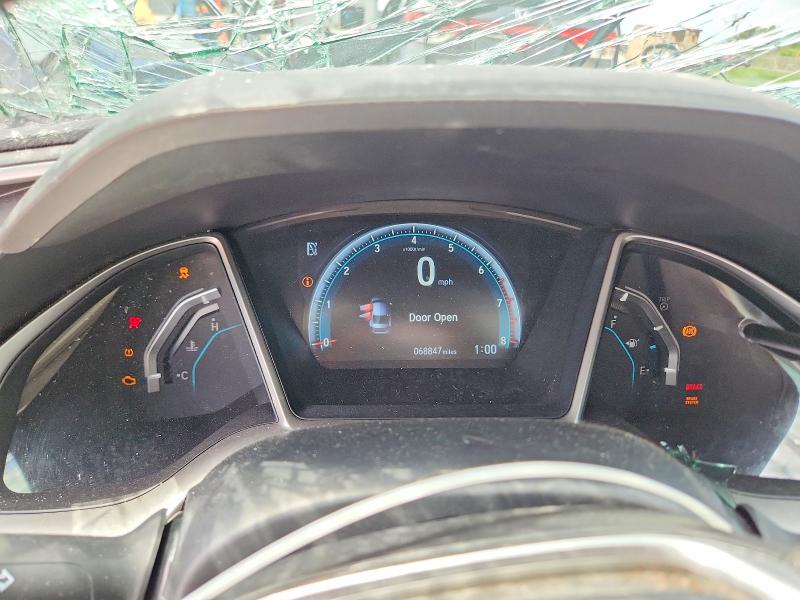 Photo 9 from auction – 2016 HONDA CIVIC with VIN 2HGFC1F3XGH659705