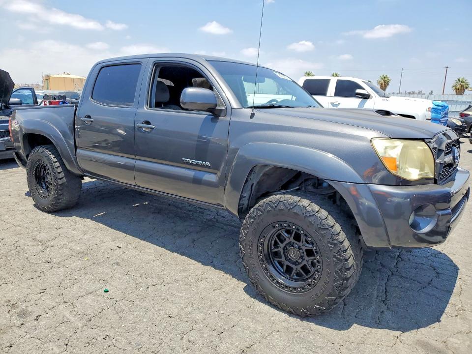 Photo 4 from auction – 2011 TOYOTA TACOMA with VIN 3TMJU4GN4BM117923