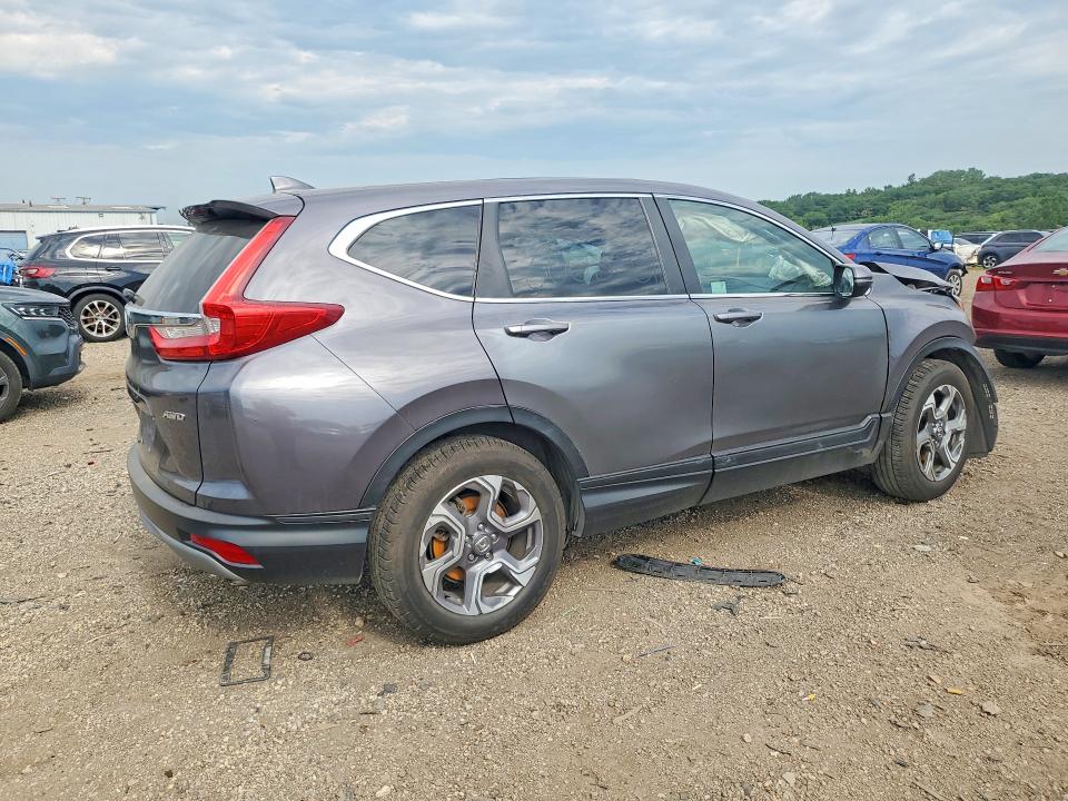 Photo 3 from auction – 2018 HONDA CR-V with VIN 7FARW2H5XJE048842