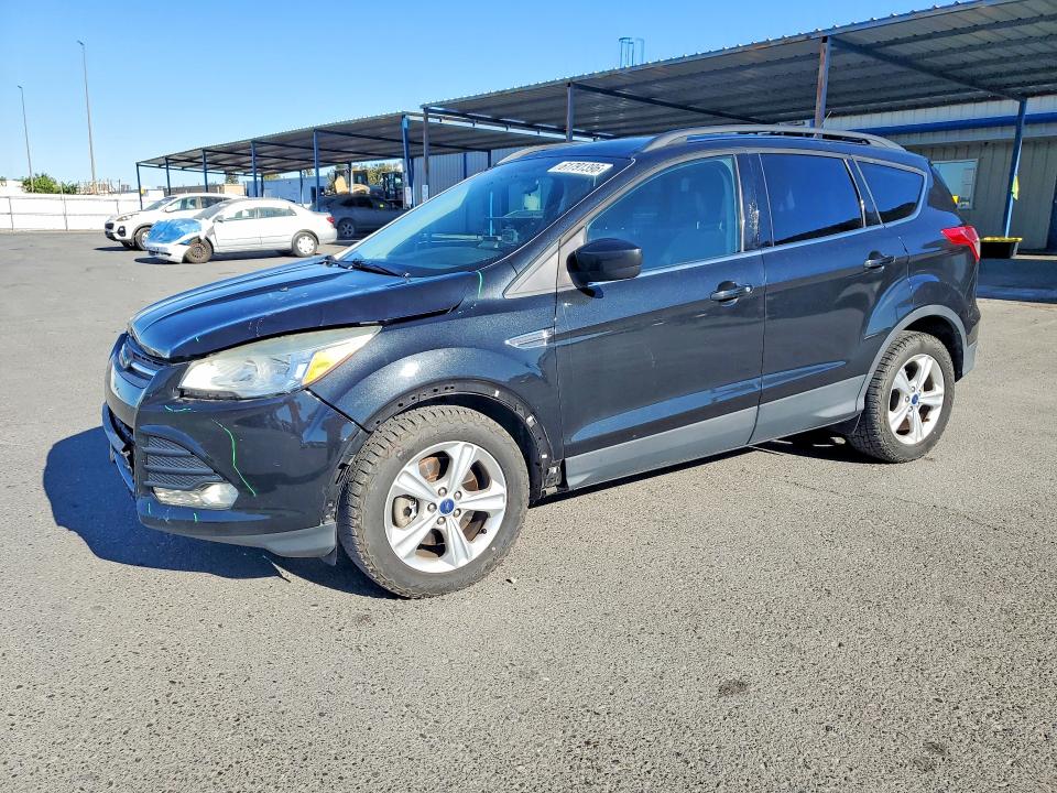 FORD ESCAPE 2014 with VIN 1FMCU9G98EUE41056 - Photo from auction