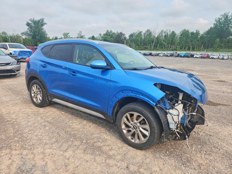 Photo 4 from auction – 2018 HYUNDAI TUCSON with VIN KM8J3CA44JU735004