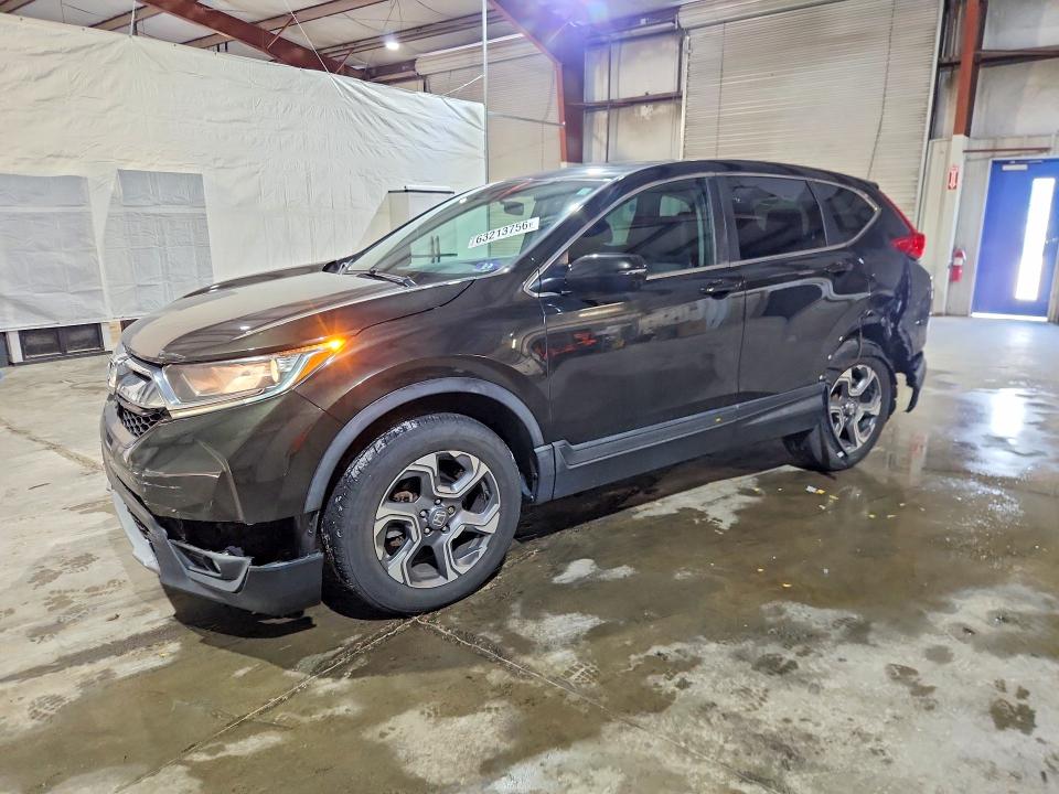 HONDA CR-V 2018 with VIN 2HKRW2H50JH696638 - Photo from auction