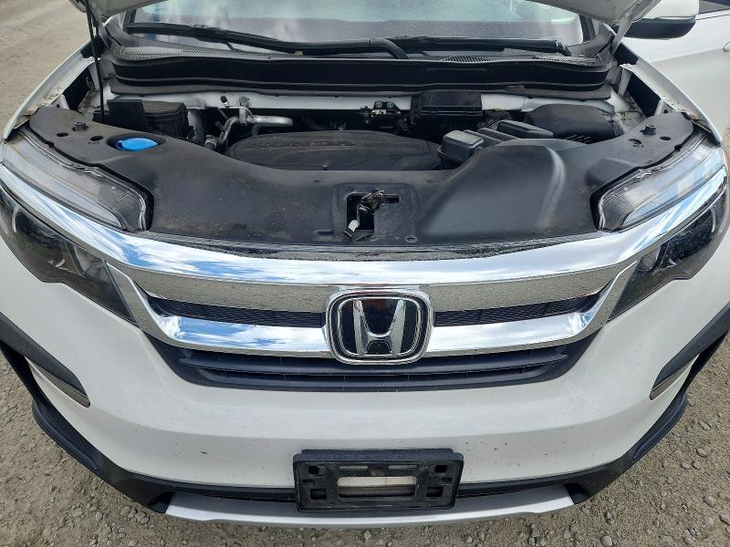 Photo 12 from auction – 2021 HONDA PILOT with VIN 5FNYF6H50MB035195