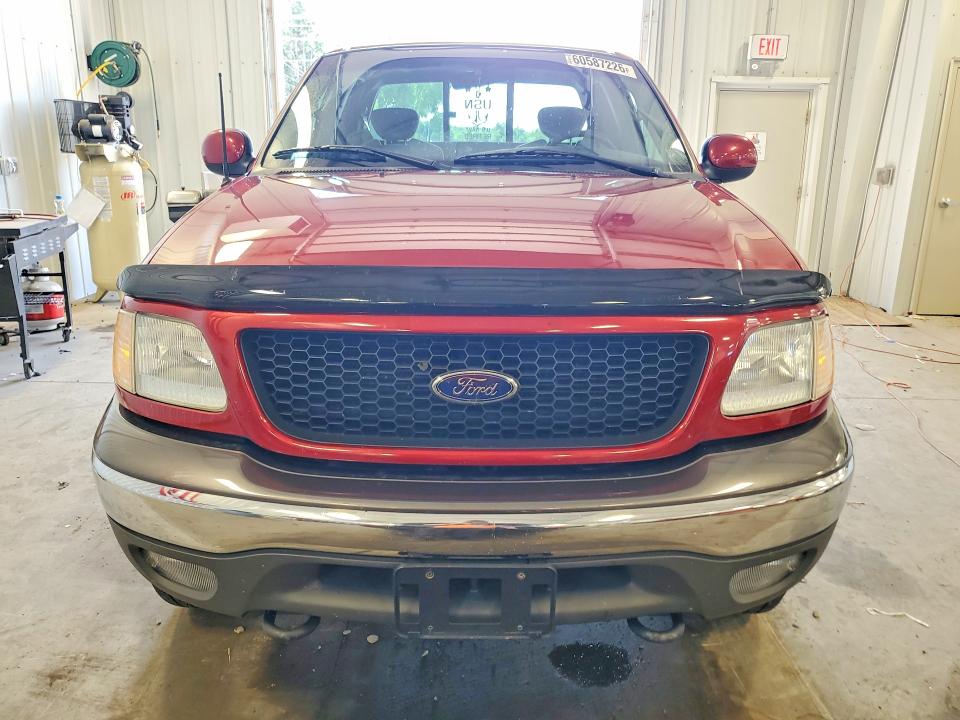 Photo 5 from auction – 2002 FORD F150 with VIN 1FTRX18L52NB73767