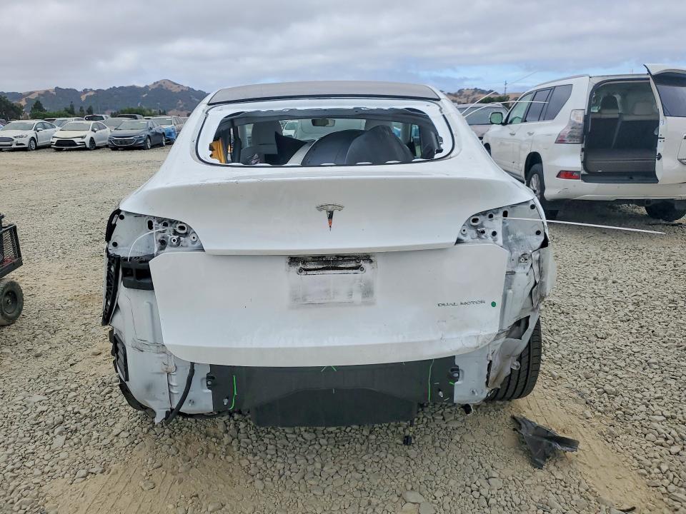 Photo 6 from auction – 2021 TESLA MODEL Y with VIN 5YJYGDEE3MF279011