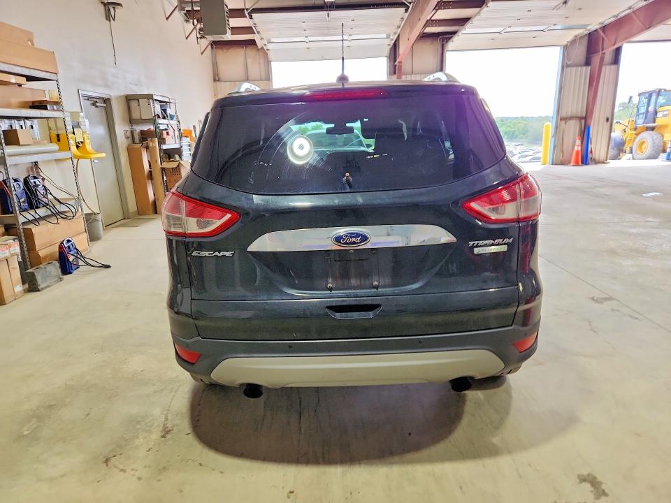 Photo 6 from auction – 2014 FORD ESCAPE with VIN 1FMCU0J98EUD48560