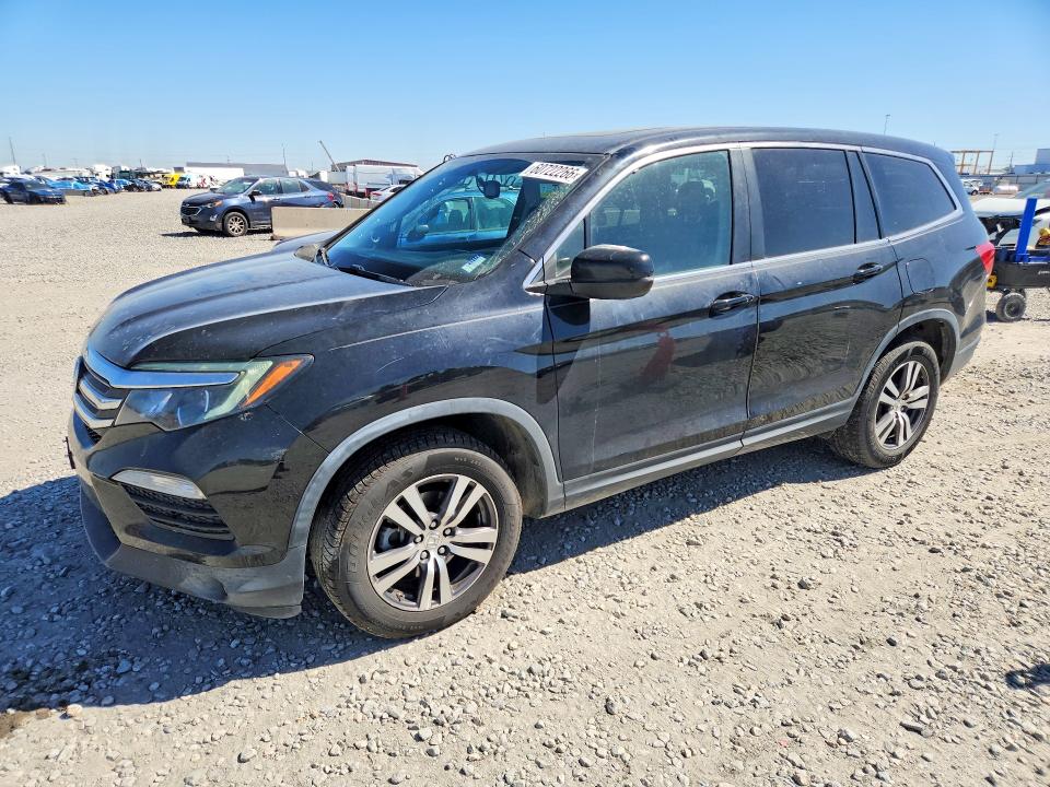 HONDA PILOT 2018 с VIN 5FNYF6H56JB036332 - Фото с аукциона
