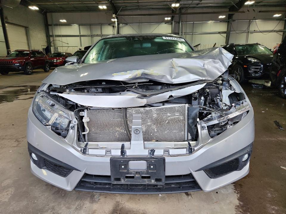 Photo 5 from auction – 2017 HONDA CIVIC with VIN 2HGFC1F93HH652259