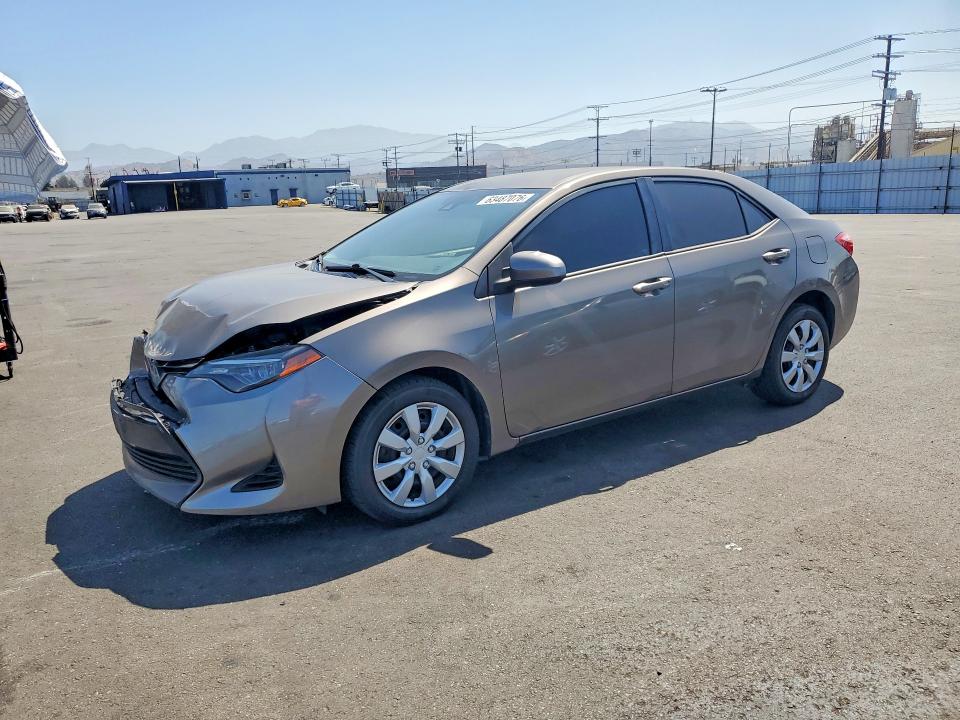 TOYOTA COROLLA 2017 con VIN 5YFBURHE0HP704511 - Foto de la subasta