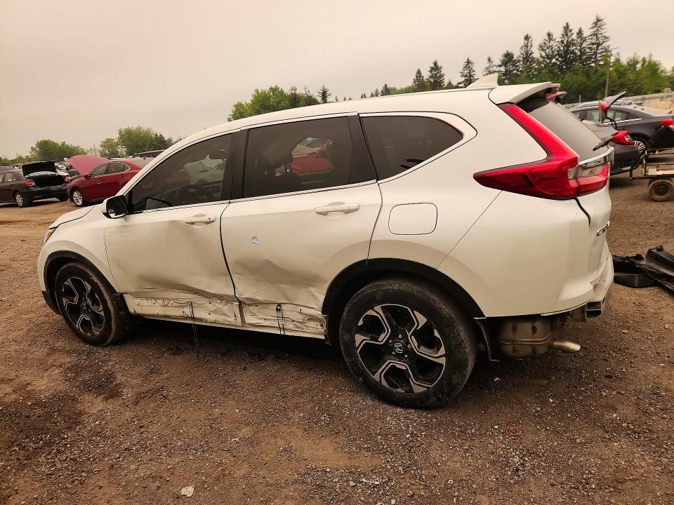 Photo 2 from auction – 2018 HONDA CR-V with VIN 2HKRW1H33JH001464