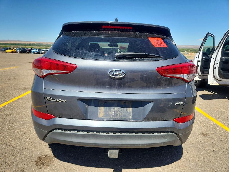 Photo 6 from auction – 2018 HYUNDAI TUCSON with VIN KM8J3CA46JU730211