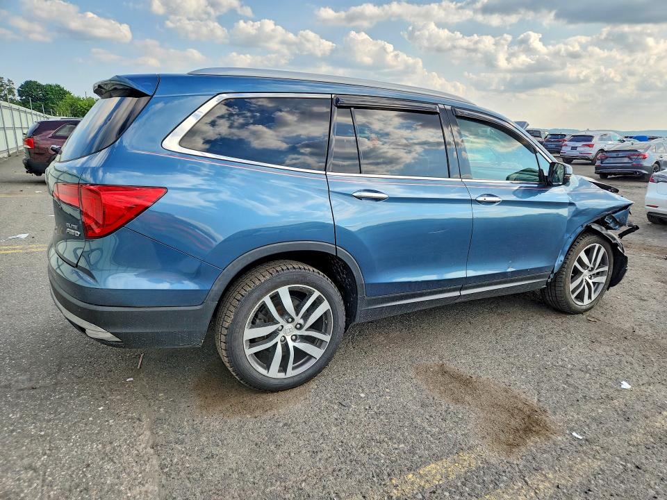 Photo 3 from auction – 2016 HONDA PILOT with VIN 5FNYF6H02GB127157