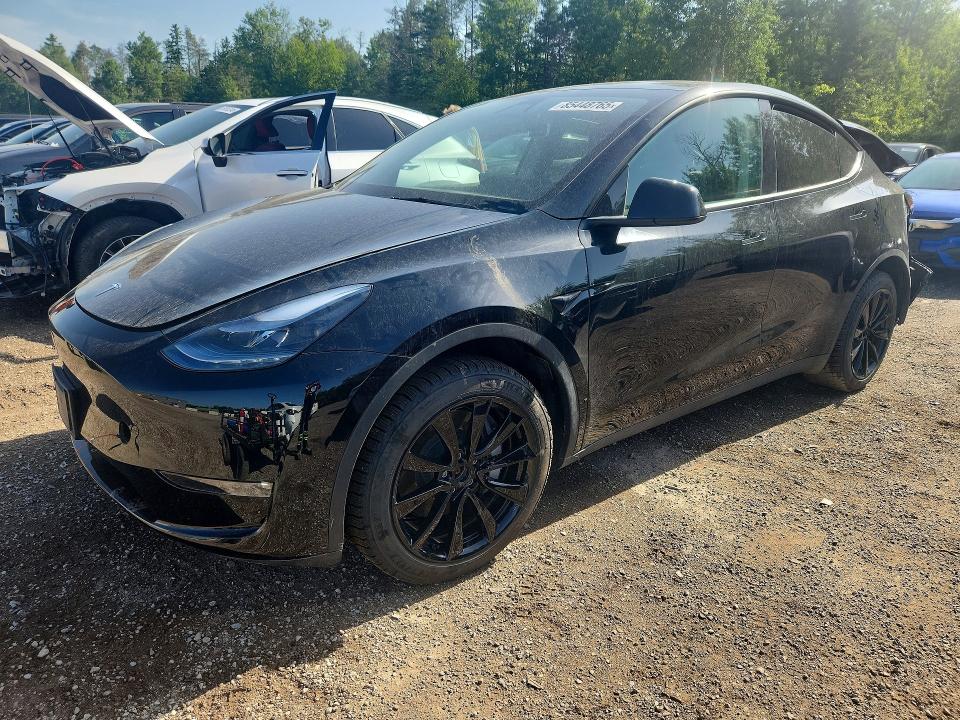 TESLA MODEL Y 2025 con VIN 7SAYGDEE0SF296462 - Foto de la subasta