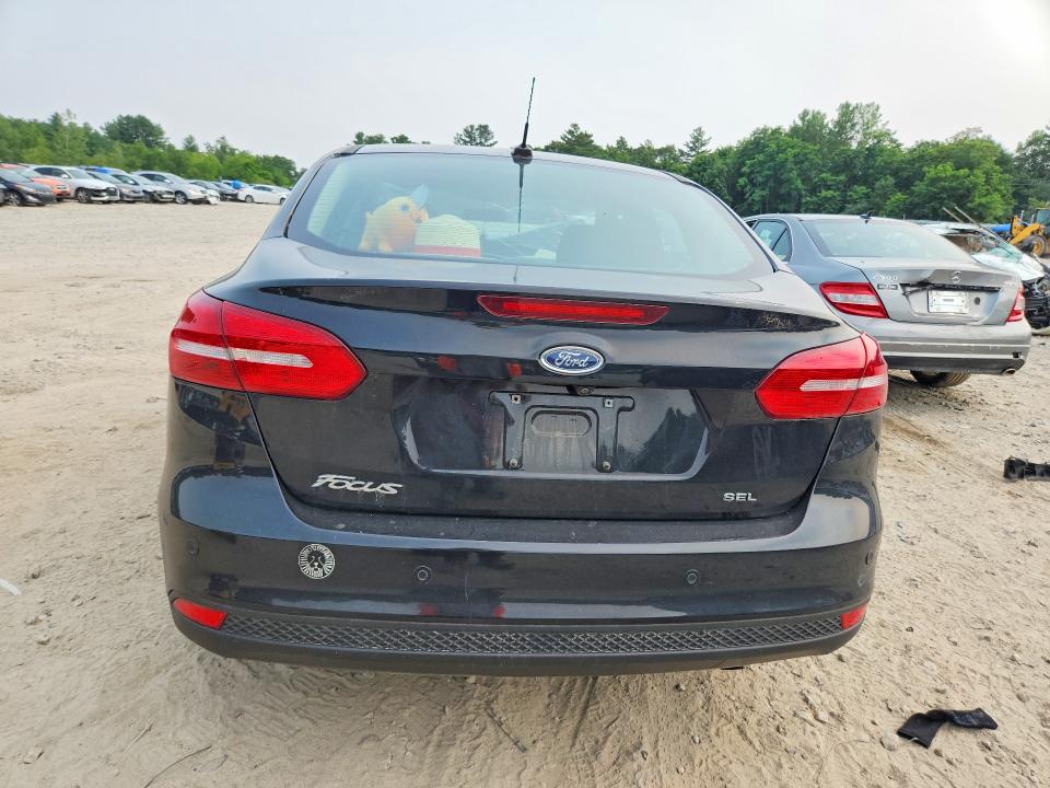 Photo 6 from auction – 2018 FORD FOCUS with VIN 1FADP3H2XJL233765