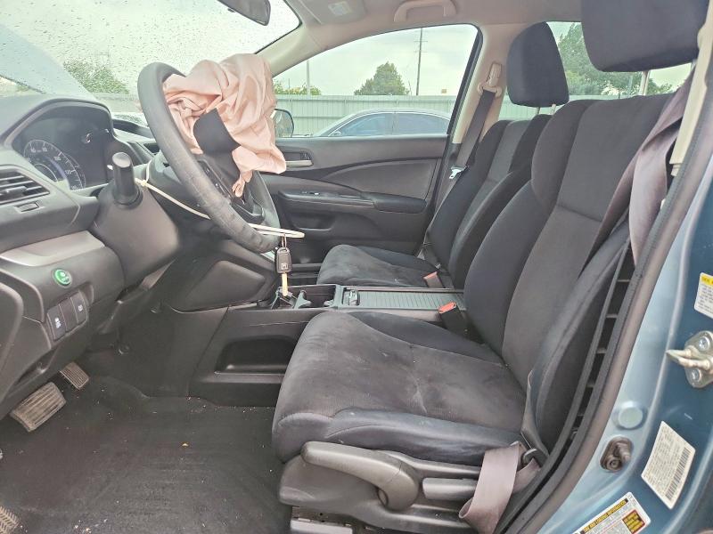 Photo 7 from auction – 2014 HONDA CR-V with VIN 2HKRM4H31EH719009
