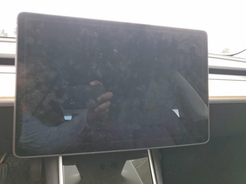 Photo 9 from auction – 2018 TESLA MODEL 3 with VIN 5YJ3E1EA1JF021853
