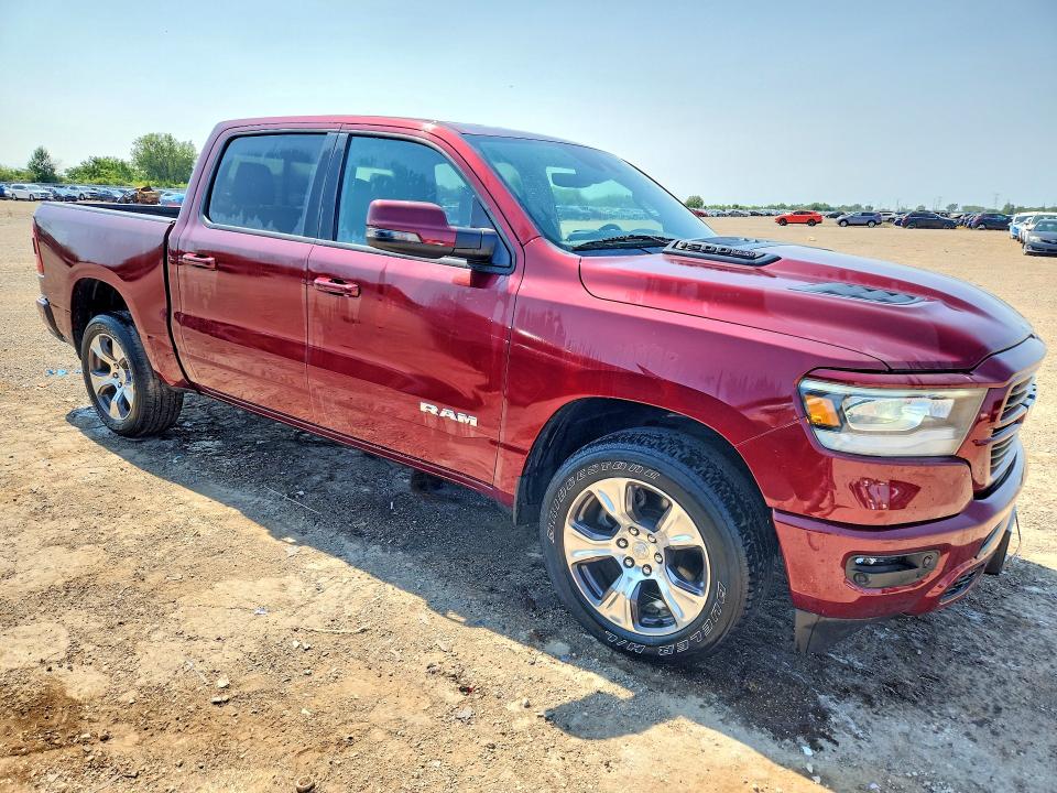 Photo 4 from auction – 2023 RAM 1500 with VIN 1C6SRFJT0PN595091