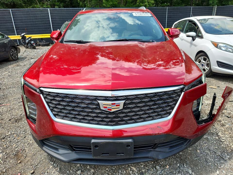Photo 5 from auction – 2024 CADILLAC XT4 with VIN 1GYFZBR49RF242498