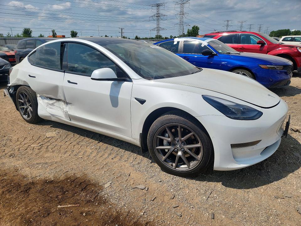 Photo 4 from auction – 2021 TESLA MODEL 3 with VIN 5YJ3E1EAXMF978311