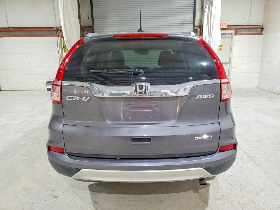 Photo 6 from auction – 2016 HONDA CR-V with VIN 5J6RM4H99GL041395