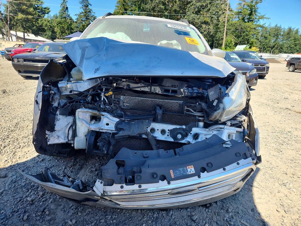 Photo 5 from auction – 2018 FORD ESCAPE with VIN 1FMCU9HD1JUA31714