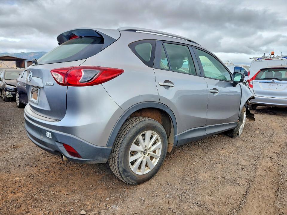 Photo 3 from auction – 2014 MAZDA CX-5 with VIN JM3KE2BE0E0320433