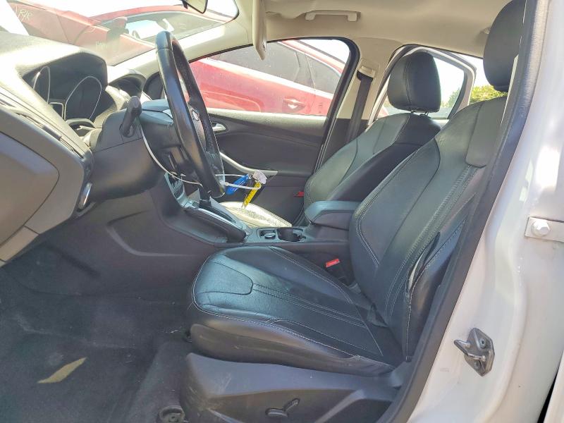 Photo 7 from auction – 2014 FORD FOCUS with VIN 1FADP3K25EL153241